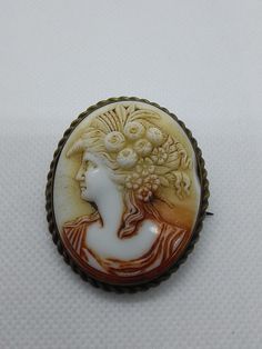 This is a beautiful item, a glass cameo set in a brass mount that was probably once gold plated. It measures approximately 38 mm x 47 mm, and weighs 16.2g. It is in excellent condition, with no scratches or breaks and a fully working clasp. Cameo Brooch, White Glass, Brooch Pin, Brooches, Music Clothes, Glass