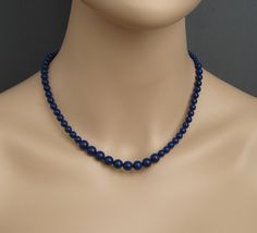 Lapis blue Swarovski pearls necklace is available in 16 inches (40.5cm), 18 inches (45.5cm) and 20 inches (51cm) long and it has an extension 2 inches (5cm) long. Please select the length for necklace.  Materials and sizes: The Swarovski pearls are made in Austria. Pearls are 8mm, 6mm and 4mm Color: Lapis blue Sterling silver chain clasp and crimps The necklace will be shipped in a small gift box. If you need more quantity? Contact us. We'd be happy to make custom pieces for you as well! Thank you for stopping by! CrystalBridalJewels Classic Blue Pearl Necklace For Gift, Formal Blue Single Strand Pearl Necklace, Blue Single Strand Pearl Necklace For Formal Occasions, Swarovski Pearl Necklace, Bridal Jewels, Lapis Blue, Pearl Cream, Blue Pearl, Wedding Jewellery Necklace