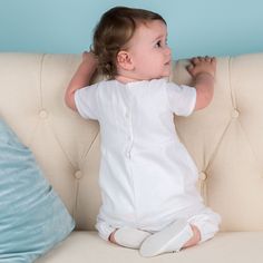 "Finn White Linen Jumpsuit Original Price $115 - SALE $28 - FINAL SALE A soft and elegant linen jumpsuit for your little guy's special day! Our Finn linen jumpsuit is made with a soft linen and cotton blend in white. Featuring a cotton ribbon in the most beautiful shade of sky blue on the bodice along with shell buttons. Snaps along the inside legs as well as three buttons on the back bodice make this jumpsuit convenient for quick and simple changes. Made to fall mid-calf to ankle length dependi White Linen Jumpsuit, Boy Baptism Outfit, Baby Boy Christening, Jumpsuit White, Baptism Outfit, Boy Christening, Cotton Ribbon, Christening Outfit