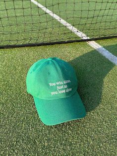 Editor's NotesBall cap designed by CLEVER FIELD. These features lettering embroidery of the legendary tennis player Arthur Rober Ashe Jr.'s famous quote. Recommend having this as a stylish point item in a sporty casual mood. - Classical ball cap shape and mood- Adjustable back strap- Color contrasting embroideryMeasurements(in.)One sizeCircumference: 23.2 in.Visor: 3.15 in.Depth: 6.3 in. Composition & Care- 100% Cotton- Please check the care label- Hand washing is recommendedDesign Classic Green Baseball Cap, Green Breathable Baseball Cap, Fun Green Baseball Cap, Playful Green Baseball Cap, Green Novelty Baseball Cap, Lettering Embroidery, Green Inspo, Sporty Casual, Tennis Player