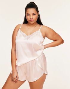 This light satin pajama set is perfect for a romantic evening. The camisole features a delicate lace trim neckline and fully adjustable straps, while the matching shorts have a flattering tulip hem and elasticated waistband for comfort. (Available in plus-sizes 1X-4X.) Chic Bra, White Bra, Plus Size Pajamas, Satin Pajama, White Bras, Satin Pyjama Set, Romantic Evening, Adore Me, Wedding Lingerie