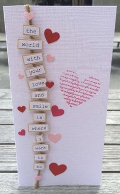 a valentine's day card with scrabbles and hearts attached to it