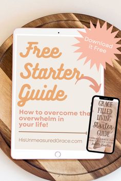 the free starter guide is sitting on top of a wooden plate next to a cell phone