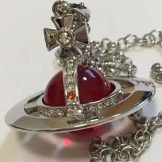 Vivienne Westwood Small Orb Necklace. Stone Color: Red. Aesthetic Vivienne Westwood, Westwood Jewellery, Orb Necklace, Lizzie Hearts, Vivienne Westwood Jewellery, Grunge Jewelry, Necklace Outfit, Necklace Stone, Red And Silver