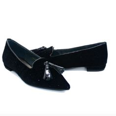 Perfect Blend Of Glamour And Sophistication. These Loafers Are Designed To Make A Statement, Adding A Touch Of Sparkle And Elegance To Any Ensemble. Crafted From Luxurious Black Sparkly Velvet, These Loafers Exude Opulence And Style, Making Them An Ideal Choice For Special Occasions Or For Adding A Touch Of Flair To Your Everyday Look. The Pointed-Toe Design Offers A Sleek And Contemporary Silhouette, While The Tassel Detail Adds A Playful And Eye-Catching Accent. Whether You're Attending A Form Black Pointed Toe Tassel Loafers For Galas, Elegant Evening Flats For Fall, Elegant Flat Suede Tassel Loafers, Elegant Black Tassel Loafers For Party, Elegant Tassel Loafers With Round Toe For Parties, Elegant Party Tassel Loafers With Round Toe, Black Suede Flats For Formal Occasions, Spring Party Slip-on Tassel Loafers, Spring Party Tassel Slip-on Loafers