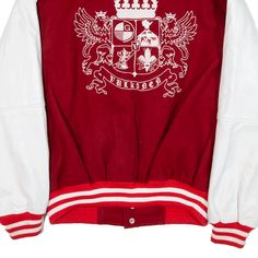 a red and white jacket with an emblem on it