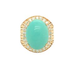 Gorgeous cocktail ring features an oval-shaped cabochon turquoise measuring 14.1 x 18 x 8.7 mm (approx). The beautiful blue turquoise is surrounded by colorless round brilliant diamond weighing approximately 1.50 carat, F color and VS clarity. The masterful craftsmanship articulates rope finish in 18K yellow gold. A true statement jewelry. It is a US ring size 8.5 and weighs 17.7 grams. The ring is in pristine condition. DATE OF MANUFACTURE late 20th century STONE Turquoise MEASUREMENT  14.1 x 1 Luxury Turquoise Oval Cabochon Ring, Rope Texture, Etsy Gold Ring, 18k Yellow Gold Ring, Yellow Gold Ring, Late 20th Century, Brilliant Diamond, Blue Turquoise, Cocktail Ring