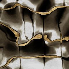 an abstract gold and silver background with wavy lines