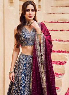 Blue and Maroon Embroidered Lehenga – Lashkaraa Chinon Sets For Reception At Navratri, Bollywood Chinon Sets With Dori Work, Embroidered Chinon Sets For Reception, Bollywood Style Sets With Dori Work In Chinon, Bollywood Style Chinon Sets With Dori Work, Reception Embroidered Chinon Sets, Chinon Sets With Intricate Embroidery For Diwali, Traditional Silk Sets For Reception, Festive Embroidered Chinon Choli