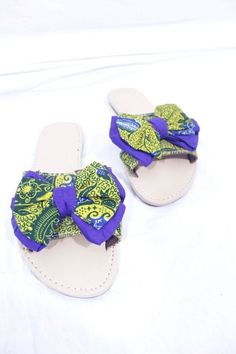 "African materials  are known for bold, unique and friendly colours. These sandals are hand  made. They are made from Ankara(cotton). They are neatly, quality and stylish made.These are perfect as a gift. Shoe Size:UK 5  Main Colour:Yellow Brand:Unbranded  Upper Material:Cotton Style:Flip Flops Heel Height:Flat (less than 0.5\") EU Shoe Size:38 Occasion:Casual" Summer Textile Sandals For Vacation, Adjustable Fabric Sandals For Summer, Fabric Sandals For Vacation, Flat Fabric Sandals For Summer, Adjustable Textile Sandals For Vacation, Adjustable Textile Beach Sandals, Handmade Casual Flat Sandals, Casual Flat Handmade Sandals, Casual Handmade Flat Sandals