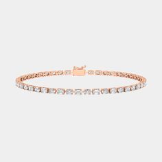 a rose gold tennis bracelet with white diamonds on the front and back side, set in 18k pink gold