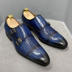 Classic Blue Slip-on Monk Strap Shoes, Classic Blue Monk Strap Slip-on Shoes, Blue Slip-on Oxfords For Office, Blue Leather Closed Toe Slip-ons, Blue Brogue Dress Shoes Closed Toe, Blue Closed Toe Dress Shoes With Brogue Detailing, Blue Slip-on Dress Shoes For Business, Blue Leather Shoes With Flat Heel For Business, Blue Leather Flat Heel Business Shoes