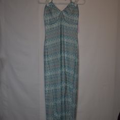 Brand: Wild Fable Style: Long Ankle Length Dress Color: Patterned Blue And White Size: Medium Material: Recycled Polyester Condition: New With Tags Absolutely Stunning Dress With An Open Back. Ankle Length With A Halter Top Light Blue Fitted Maxi Dress For Beach, Fitted Light Blue Maxi Dress For Beach, Fitted Light Blue Maxi Dress For Vacation, Blue Stretch Sundress Maxi Dress, Blue Stretch Maxi Dress For Day Out, Blue Stretch Maxi Dress For Vacation, Blue Maxi Dress For Beach, Blue Maxi Dress For The Beach, Ankle Length Dress