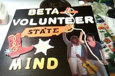 there is a sign that says,'be a volunteer state mind'and an image of a man holding a guitar