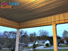 an outdoor covered patio with the words fun times guide on it's front porch