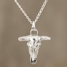 Stunning and handsome, the skull of a bull is realized in sterling silver, treated with a combination of finishes. Arunima presents this men's pendant necklace, crafted by Indian artisans. Mens Pendant Necklace, Modern Silver Earrings, Mens Necklace Pendant, Skull Pendant Necklace, Bull Skull, A Bull, Sterling Silver Rings Bands, Unusual Jewelry, Skull Pendant