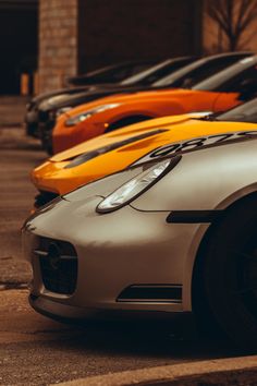 Line up at a car meet in downtown Indianapolis. A grey Porche, then a yellow and orange car, with two black cars in the background. Car Style Photography, Sport Car Photography, Cars Lined Up, Two Cars Photography, Classic Car Pictures, Sport Car Photoshoot, Car Photography Composition, Professional Car Photography