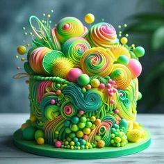 a colorful cake with swirls and bubbles on it