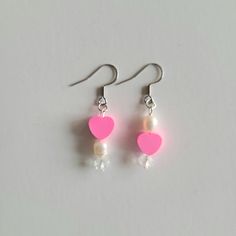 Pink Heart And Pearl Earrings. Made With Clay Beads, Glass Beads, And Freshwater Pearls. Nickel Free Findings. Brand New Condition. Ships Next Business Day Offers Are Welcome Jewelry Sale Buy 2 Get 1 Free Buy 4 Get 2 Free Bundle And Save Coquette Boho Chic Bohemian Casual Soft Spring Summer Unisex Doll Core Fairycore Gift Present Twee Trendy Jewelry 90s 2000s White Heart Bead Dangle Earrings, White Heart Beads Dangle Earrings, White Dangle Heart Bead Earrings, White Dangle Heart Earrings With Beads, White Heart Beads Earrings For Valentine's Day, White Heart Earrings With Beads For Valentine's Day, Pink Heart-shaped Pearl Drop Jewelry, Cute Heart Beads Dangle Jewelry, White Double Heart Earrings With Heart Beads