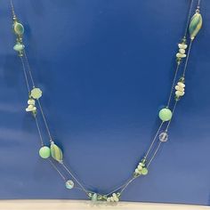 Very Pretty Green Beaded Necklace Never Worn Elegant Green Necklace For Beach, Elegant Multi-strand Necklaces For Summer, Elegant Multi-strand Necklace For Summer, Elegant Long Beaded Necklace For Beach, Elegant Beach Necklaces With Faceted Beads, Elegant Beach Necklace With Faceted Beads, Elegant Beach Long Necklace With Round Beads, Elegant Single Strand Beaded Necklace For Summer, Beaded Double Strand Long Necklace