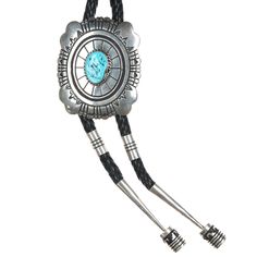 48" Large Tommy and Rosita Singer Navajo sterling bolo tie with turquoise.   Measurements in pics. All precious metals are tested and guaranteed. A Native American jewelry piece referred to as "silver" or "ingot" is guaranteed to be at least 90% silver. I rarely use the word "sterling" when referring to older Native American silver or really any older silver jewelry as silver contents vary and "sterling" is 92.5% silver. No older jewelry is going to be exactly 92.5% silver, some a little over, s Southwestern Lariat Bolo Tie For Rodeo, Artisan Turquoise Bolo Ties With Concho, Southwestern Turquoise Lariat Bolo Tie, Concho Lariat Bolo Ties For Rodeo, Southwestern Silver Bolo Ties For Rodeo, Southwestern Lariat Bolo Ties For Ranch, Southwestern Silver Bolo Tie For Rodeo, Western Silver Lariat Bolo Ties, Artisan Silver Bolo Tie With Concho