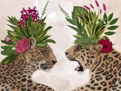 two leopards with flowers on their heads are facing each other in front of a mirror