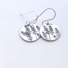 "Lavender Earrings - Silver Disk Earrings, Spring or Summer Earrings, Cute Earrings Gift For Her, Wildflower Earrings, Floral Earrings 5/8\" pewter or sterling silver discs are stamped with beautiful lavender flowers. They hang from sterling silver ear wires. The earrings measure about 1\" from the top of the earwire to the bottom of the disc. Choose your disc metal from the drop down box (earwires are always sterling silver!)" Silver Botanical Earrings For Gift, Botanical Silver Earrings For Gift, Silver Botanical Earrings As Gift, Botanical Style Silver Earrings For Gift, Botanical Flower Drop Earrings, Handmade Silver Botanical Earrings, Sterling Silver Earrings With Ear Wire For Mother's Day, Botanical Dangle Matching Earrings Jewelry, Botanical Style Jewelry With Matching Dangle Earrings