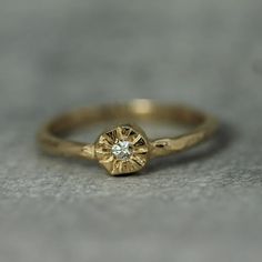 This item is made to order, please allow 2-3 weeks for production and delivery. The juxtaposition of the perfectly sparkly diamond and the rustic hand-carved feel of the solid gold sunshine setting makes this design feel extra special. The little sun diamond ring is lovely stacked or on its own, as a unique engagement ring or a just-for-fun ring! It pairs perfectly with the little sunrise ring.  2mm diamond  top of the ring is approx 5mm x 5mm  1.7mm wide hand-carved band solid 14k gold Unique Gold Engagement Rings Vintage, Unique Wedding Rings Boho, Unique Simple Engagement Rings, Sunrise Ring, Unique Gold Engagement Rings, Simple Unique Engagement Rings, Wax Jewelry, Sun Ring, Contemporary Fine Jewelry