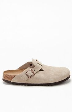 The Women's Taupe Boston Soft Footbed Clog from Birkenstock are the most sought-after clog, adding a fashion-forward edge to any style. Crafted from velvety suede for timeless appeal, they feature an adjustable strap and a soft footbed with an additional foam layer for extra cushioning and all-day support.Suede leather upperCushioned soft footbedSuede footbed liningEVA soleFlexible and lightweightAdjustable strap with metal pin buckleMade in Germany quality stamp on footbed Birkenstock Womens Wo Beige Boston Birkenstock Outfit, Birken Stock Clogs, Birkin Stocks, Birkenstocks Clogs, Womens Birkenstocks, Boston Soft Footbed, Taupe Sandals, Birkenstock Clog, Birkenstock Clogs