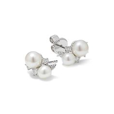 These stylish cluster earrings boast four 4-5mm cultured freshwater pearls and ten round natural diamonds  at approximately .29 carat total weight. These gorgeous gems are crafted in a quality sterling silver setting. Pearl Diamond Earrings, Pearl And Diamond Earrings, Freshwater Cultured Pearls, Pearl Diamond, Cluster Earrings, Fresh Water, Freshwater Pearls, Natural Diamonds, Diamond Earrings