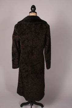 "Vintage 60s 70s Coat Wonderful vintage 60s 70s brown faux Persian lambswool coat with black faux fur collar by Niccolini! Gorgeous color combination, with some pretty amazing buttons! Lining is in nice condition, and the coat overall is in great condition, just the tiniest bit of matting on the collar--see photos. Lovely coat! Bust:40\" Waist:38\" Hips:42\" Length:43\" Sleeve:23\" Shoulder to shoulder:15.5\" Label: Niccolini and ILGWU Canada label 1960" Brown Faux Fur Coat, Vintage Dress 60s, Knitted Suit, 60s Dress, Black Faux Fur, Faux Fur Collar, Knit Vest, Fur Collars, Faux Fur Coat