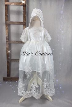 This is a handmade girls baptism gown made with beautiful lace that has sequins and beads rhinestones if you have any questions feel dress to contact me ! Elegant Organza Princess Dress For Confirmation, Princess Style Organza Gown For Baptism, White Tulle Baptism Dress For Ceremony, White Organza Baptism Dress For Party, White Princess Gown For Confirmation, White Princess Gown For First Communion, White Tulle Gown For Baptism, Elegant Organza Baptism Dress, White Organza Gown For Baptism