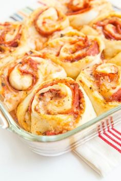 a casserole dish filled with meat and cheese