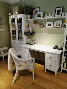 a white desk and chair in a room