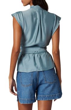 This luxe silk-enriched blouse is designed in a wrapped silhouette with a defining tie belt. Surplice V-neck Cap sleeves 85% viscose, 15% silk Hand wash, dry flat Imported Belt Tying, Wrap Top, Tie Belt, Cap Sleeves, Top Brands, Hand Wash, Nordstrom, V Neck, Silk