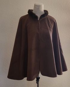 Follow us on: Instagram.com/atelierpucci Pinterest.com/atelierpucci Facebook.com/ AtelierPucciCostumes A timeless, elegant gift of haute couture. We offer "Ready to Ship," a Victorian cloak in solid brown wool poly blend and faux fur around the collar. The cape is lined. The side insert guarantees the wider of the cloak. Fabric: Wool blend. Size: S, M, L. Costume ready-to-ship is a cheaper solution we can offer to customers. If you find your size, design, fabrics, and color, you be sure this is a good opportunity. Please understand that customer order is a different question. We work for you customizing everything for you, taking care of every single detail.   Please contact for details (size, measurements needed, color, payment note, time to delivery).  Come shipping in a box and is insur Elegant Fitted Cape For Costume Party, Elegant Cape For Costume Party, Victorian Theatre, Brown Cloak, Victorian Cloak, Chara Design, Fur Cape, Solid Brown, Brown Fur