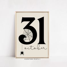 a black and white poster with the number thirteen on it's side, next to a spider web