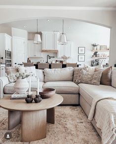 a living room filled with furniture and decor