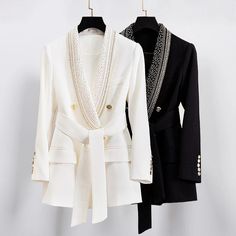 This modern blazer is a stylish layer for your attire, with a bold belt decoration adorned with pockets and buttons, creating a vibrant look. Crafted from high-quality cotton, it features a single-button closure, exuding simplicity with its clean solid pattern. The turn-down collar adds sophistication and subtle diamond details enhance appeal. Elevate your stylish look with this chic and fashionable blazer for women.SpecificationsBrand Name: GeraldBlack Sleeve Length(cm): FullDecoration: BeltDecoration: PocketsDecoration: ButtonThickness: Thin (Summer)Material: COTTONType: RegularClothing Length: RegularStyle: High StreetCollar: Turn-down CollarOrigin: Mainland ChinaCN: GuangdongSeason: Spring/SummerPattern Type: SolidPlace Of Origin: China (Mainland)Closure Type: Single ButtonSleeve Style Formal Smart Casual, Wedding Blazer, Womens Blazer Coat, Blazer With Belt, Embellished Belt, Retro Jacket, Long Blazer, Women Shawl, White Blazer