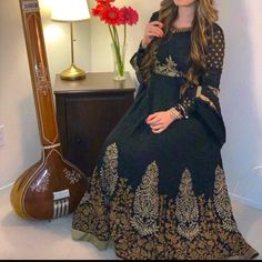 Very Beautiful And Comfortable Looks Brand New Black Floor-length Dress With Pallu Detail, Black Floor-length Dress With Pallu, Fitted Black Abaya For Eid, Fitted Embroidered Black Abaya, Black Traditional Wear For Transitional Party, Black Embroidered Abaya For Wedding, Black Embroidered Wedding Abaya, Fitted Black Abaya For Wedding, Wedding Black Embroidered Abaya