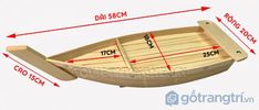 a small wooden boat with measurements for the bottom and side sections on it's sides