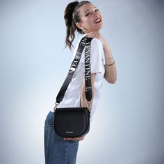 Our Classic Crossbody is simplicity and subtlety in a compact, timeless form. Made from recycable preimume vegan leather, this classic leather shows its wear beautifully over time. An adjustable wide strap and slim silhouette allows for a comfortable and flattering carry, day or night. Size L 7.7 In x W 2.5 In x H 6.3 In. Straps length 34 In-50 In 1 major zipper pocket 2 open compartment Elegant Leather Shoulder Bag With Logo Strap, Modern Crossbody Bag Strap, Evening Shoulder Bag With Logo Strap, Trendy Leather Bag Strap With Logo, Luxury Everyday Bag Strap, Black Leather Bag Strap With Logo, Black Leather Logo Strap For Bags, Luxury Bag Strap For Everyday, Chic Single Shoulder Bag Strap