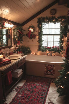 a bathroom decorated for christmas with wreaths and lights on the windows above the bathtub