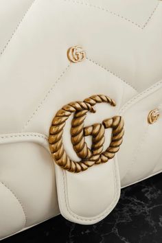 Luxury Cream Gucci Bag, High-end Gucci Shoulder Bag With Gold-tone Hardware, Gucci Beige Bags With Gold-tone Hardware, Luxury Gucci Bag With Gold-tone Logo Plaque, Luxury Gucci Bag With Gold-tone Hardware, Gucci Gg Marmont, Gg Marmont, Net A Porter, Women Collection