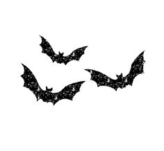 two bats that are black and white on a white background, with some speckles