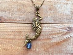 Whimsical mermaid necklace with a blue glass pearl, Selma Dreams Bohemian Mermaid Necklace For Gifts, Bohemian Mermaid Necklace Gift, Whimsical Mermaid, Large Mermaid, Whimsical Necklace, Teal Glass, Unusual Necklace, Mermaid Pendant, Blue Mermaid