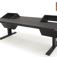 an office desk with two black trays on it's legs and a white background