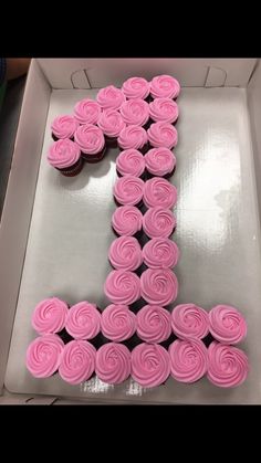 cupcakes are arranged in the shape of the letter j