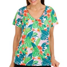 Caribbean Joe Shirt Size Large Nwt This Short Sleeve Top Features A Colorful Print Design On Lightweight Fabric, Tank Top Lining, V-Neckline With Embellished Detail, And A Classic Fit. Top Length Measures Approximately 26in. Fabrication 70% Polyester, 30% Rayon. Multicolor V-neck T-shirt For Vacation, Casual Summer V-neck Top With Floral Print, Casual Floral Print Short Sleeve V-neck Top, Printed V-neck T-shirt For Vacation, Casual Short Sleeve V-neck Top With Floral Print, Green V-neck Top For Vacation, Multicolor Tropical Print V-neck Top, Green Tropical Print V-neck Blouse, Green V-neck Top For Summer