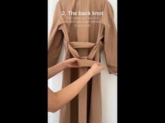 3 Ways to Tie a Trench Coat - YouTube How To Tie The Back Of A Trench Coat, How To Tie A Trench Coat Belt In The Back, Tying A Trench Coat Belt, How To Tie A Trench Coat In The Back, How To Tie A Coat Belt In The Back, Tie Coat Belt Back, Trench Coat Tie Belts, Coat Tied Around Waist, Trench Coat Tied In Back